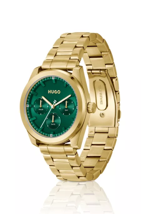 Gold-tone watch with green dial
