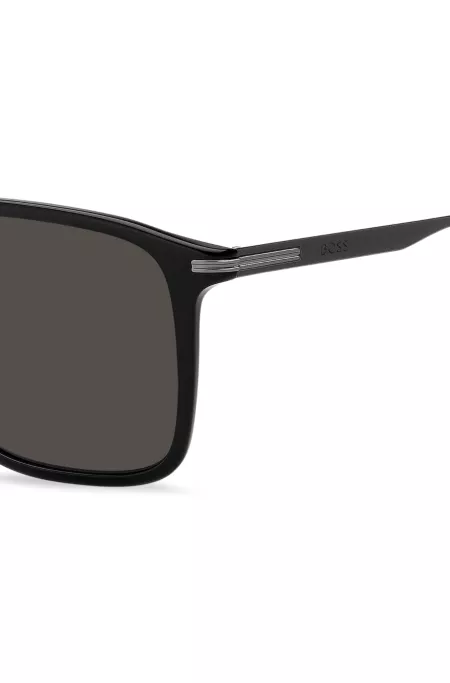 Matte-black sunglasses with stripe detail