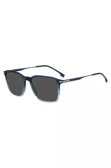 Blaue Sonnenbrille mit Degradé-Optik und Streifen-Detail