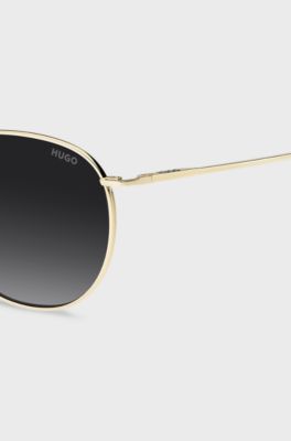 Gold-tone sunglasses with logo detail, Gold tone