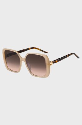 Transparente Sonnenbrille in Nude mit Double-B-Monogramm, Beige