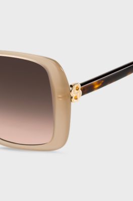 Occhiali da sole trasparenti color nudo con monogramma Double B, Beige