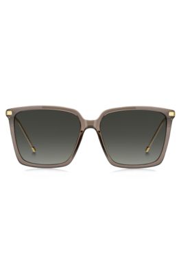 Transparent-braune Sonnenbrille mit goldfarbenen Details, Beige