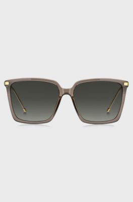 Transparent-brown sunglasses with gold-tone trims, Beige