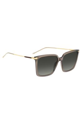 Transparent-braune Sonnenbrille mit goldfarbenen Details, Beige