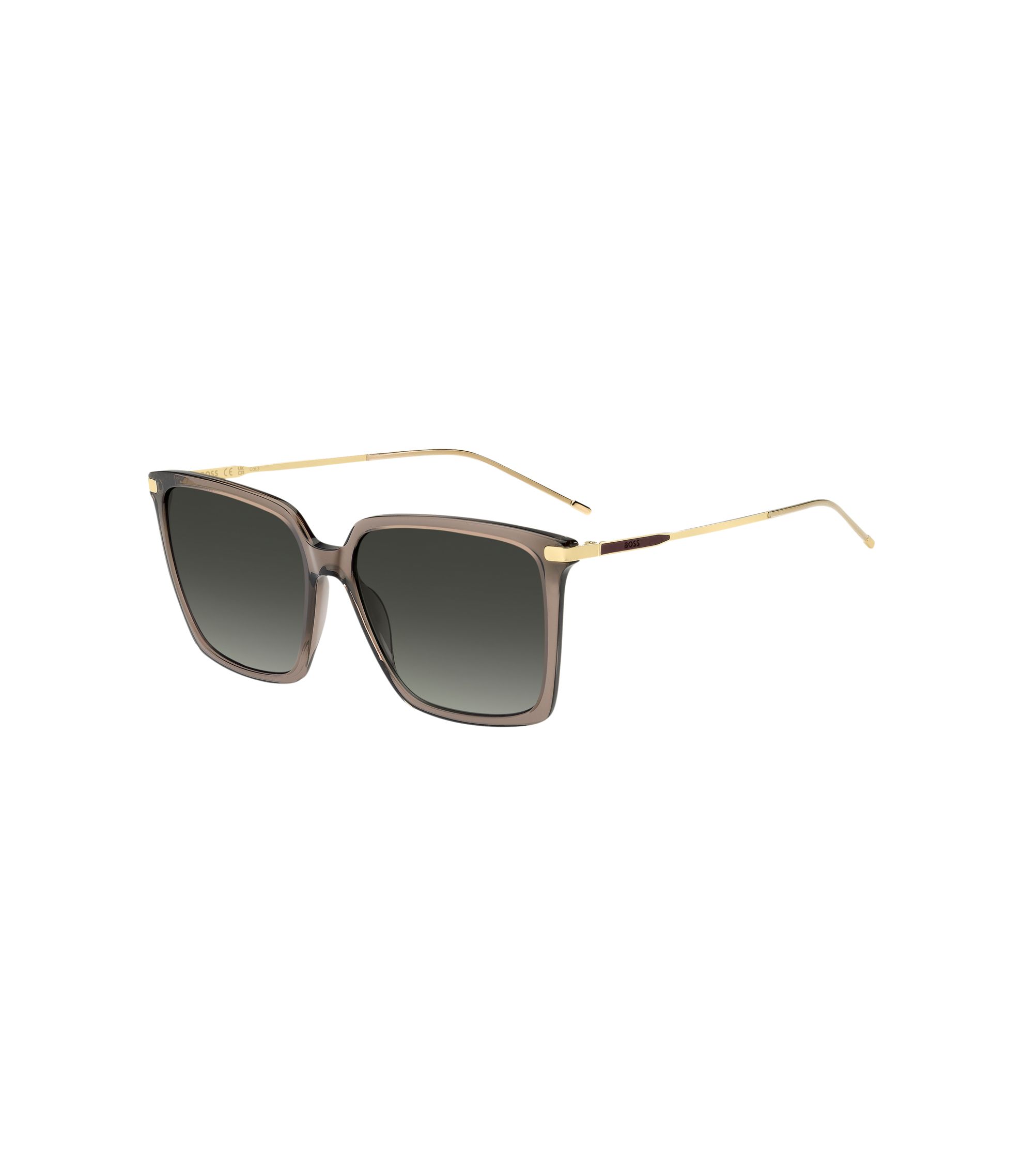 Transparent-braune Sonnenbrille mit goldfarbenen Details