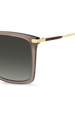 Transparent-braune Sonnenbrille mit goldfarbenen Details, Beige