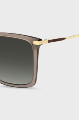 Transparent-brown sunglasses with gold-tone trims, Beige