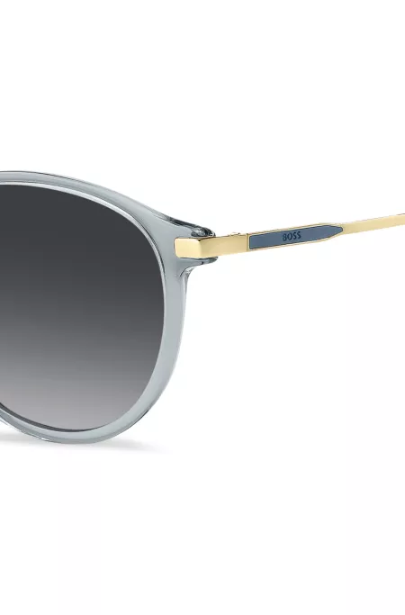 Blue-grey sunglasses with gold-tone temples