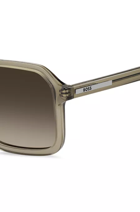 Lunettes de soleil marron transparent avec détails de logo