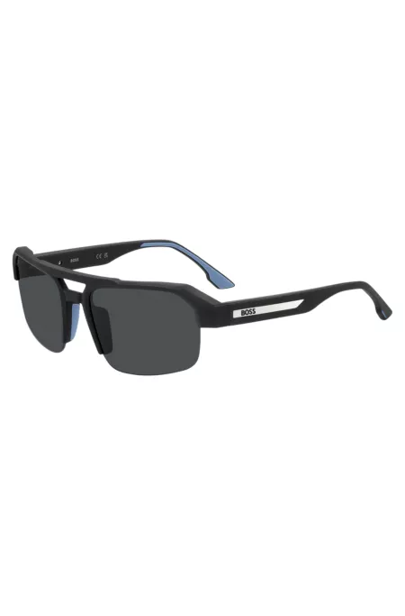 Black sunglasses with temple insert and logo