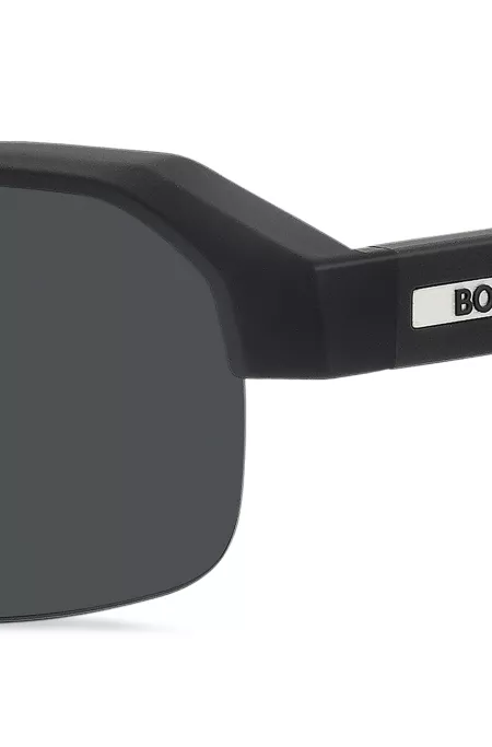 Black sunglasses with temple insert and logo