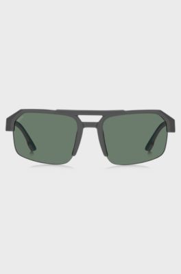 Graue Sonnenbrille mit Einsatz und Logo an den B&uuml;geln, Grau