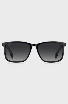Black sunglasses with green inner temples and logo inserts, Assorted-Pre-Pack