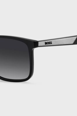 Black sunglasses with green inner temples and logo inserts, Assorted-Pre-Pack