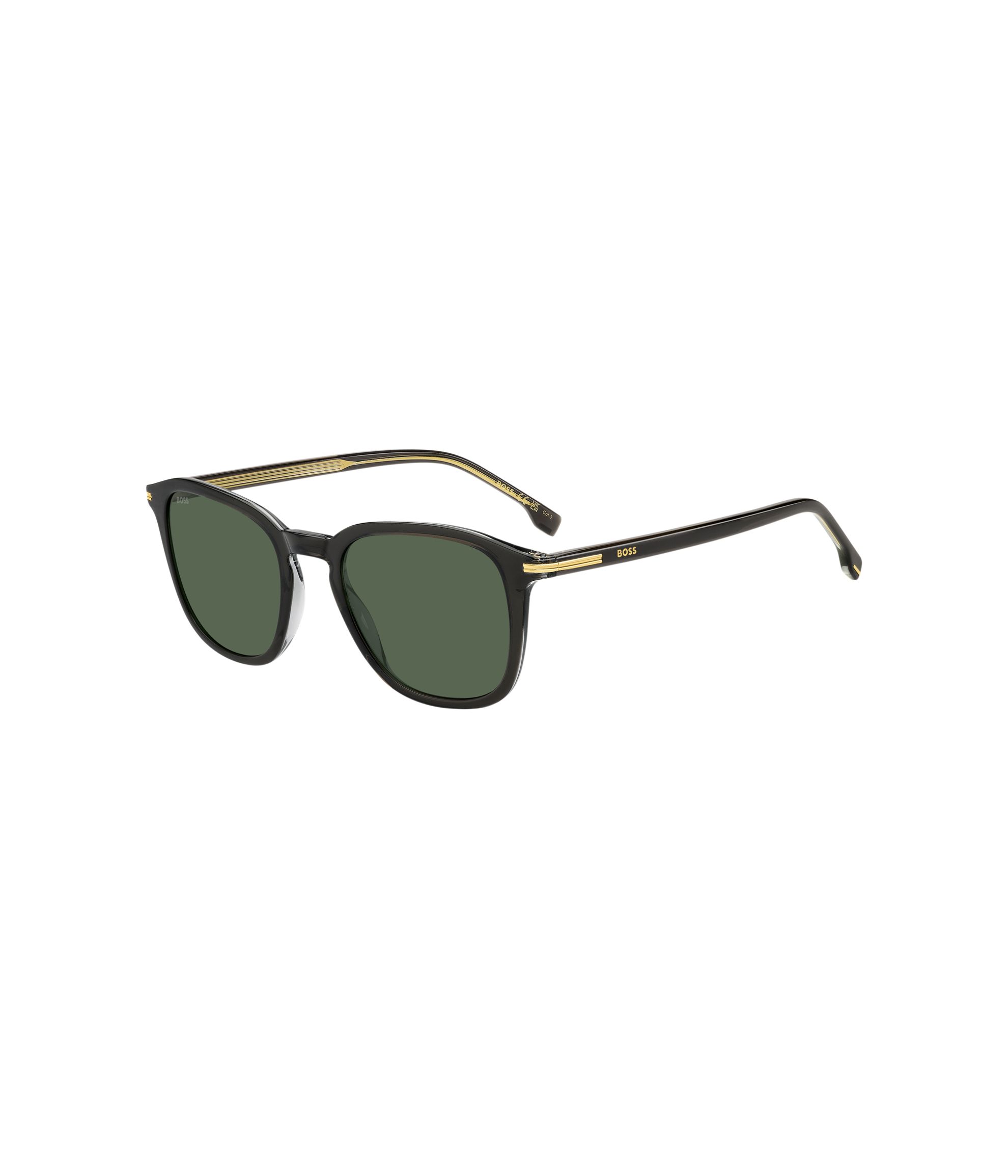 Sonnenbrille aus schwarzem Acetat mit goldfarbenen Details