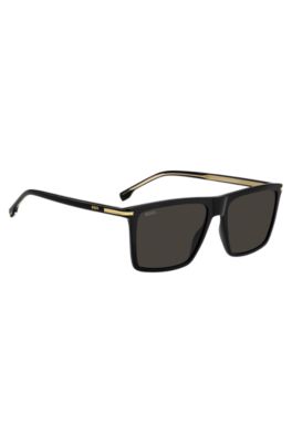 Sonnenbrille aus schwarzem Acetat mit goldfarbenen Details, Schwarz
