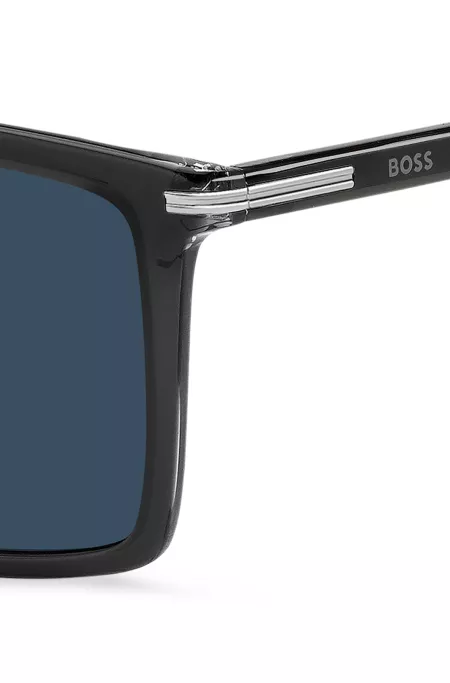 Gafas de sol de acero negro con rayas en las patillas
