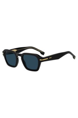 Sonnenbrille aus schwarzem Acetat mit goldfarbenen Details, Schwarz