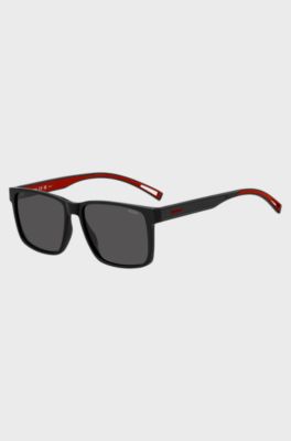 HUGO Eyewear x VCARB Lunettes de soleil en ac&eacute;tate noir avec logo en gomme, Noir