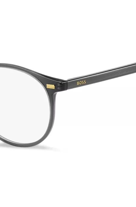 Dark-grey optical frames with gold-tone trims