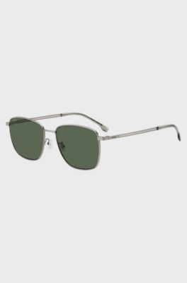 Titanium sunglasses with green shaded lenses, Silver tone