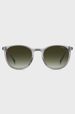 Transparent-graue Sonnenbrille mit gr&uuml;nem Logo, Hellgrau