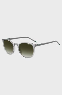 Transparent-graue Sonnenbrille mit gr&uuml;nem Logo, Hellgrau