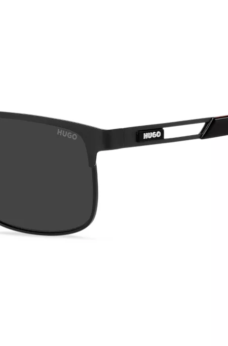 Black sunglasses with rubber logo