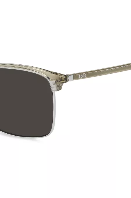 Sonnenbrille mit Titanbügeln und lasergravierten Logos