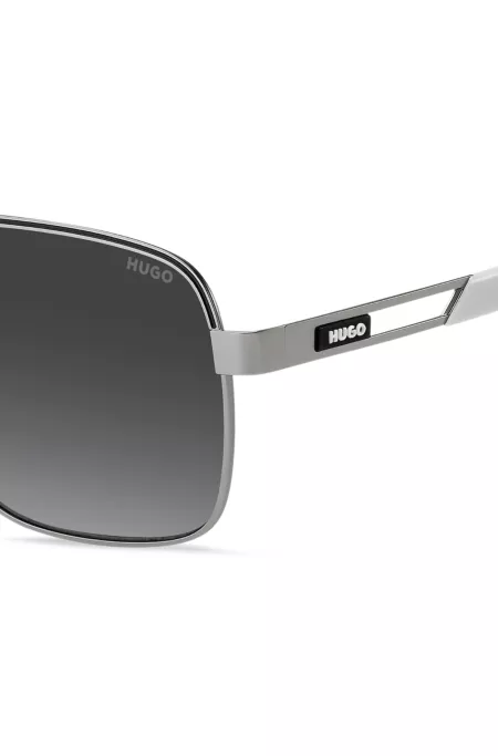 Double-bridge sunglasses in stainless steel with rubber logo
