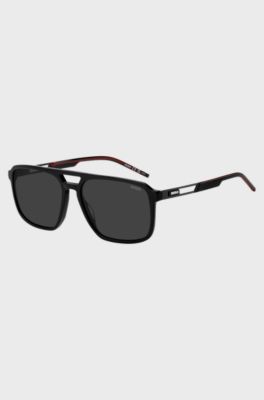 Occhiali da sole in acetato nero con logo in gomma, Nero