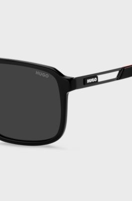 Occhiali da sole in acetato nero con logo in gomma, Nero