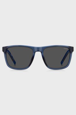 Occhiali da sole trasparenti blu con aste a motivi, Blu