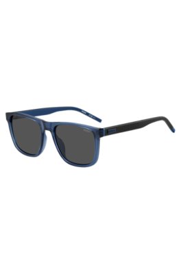 Transparent-blue sunglasses with patterned temples