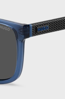 Transparent-blue sunglasses with patterned temples, Blue