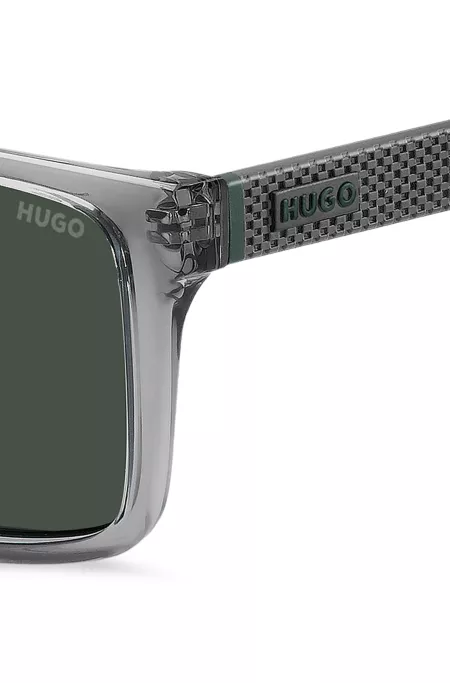 Transparent-grey sunglasses with patterned temples