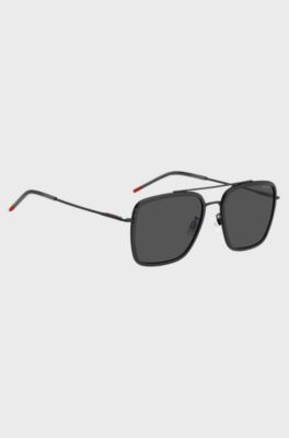 Occhiali da sole color grigio scuro con cerniere flessibili, Nero