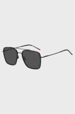 Occhiali da sole color grigio scuro con cerniere flessibili, Nero