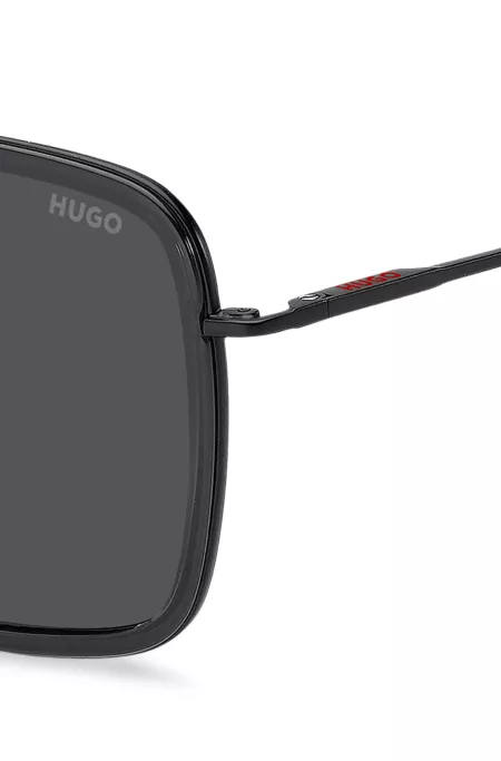 Dark-grey sunglasses with flex hinges