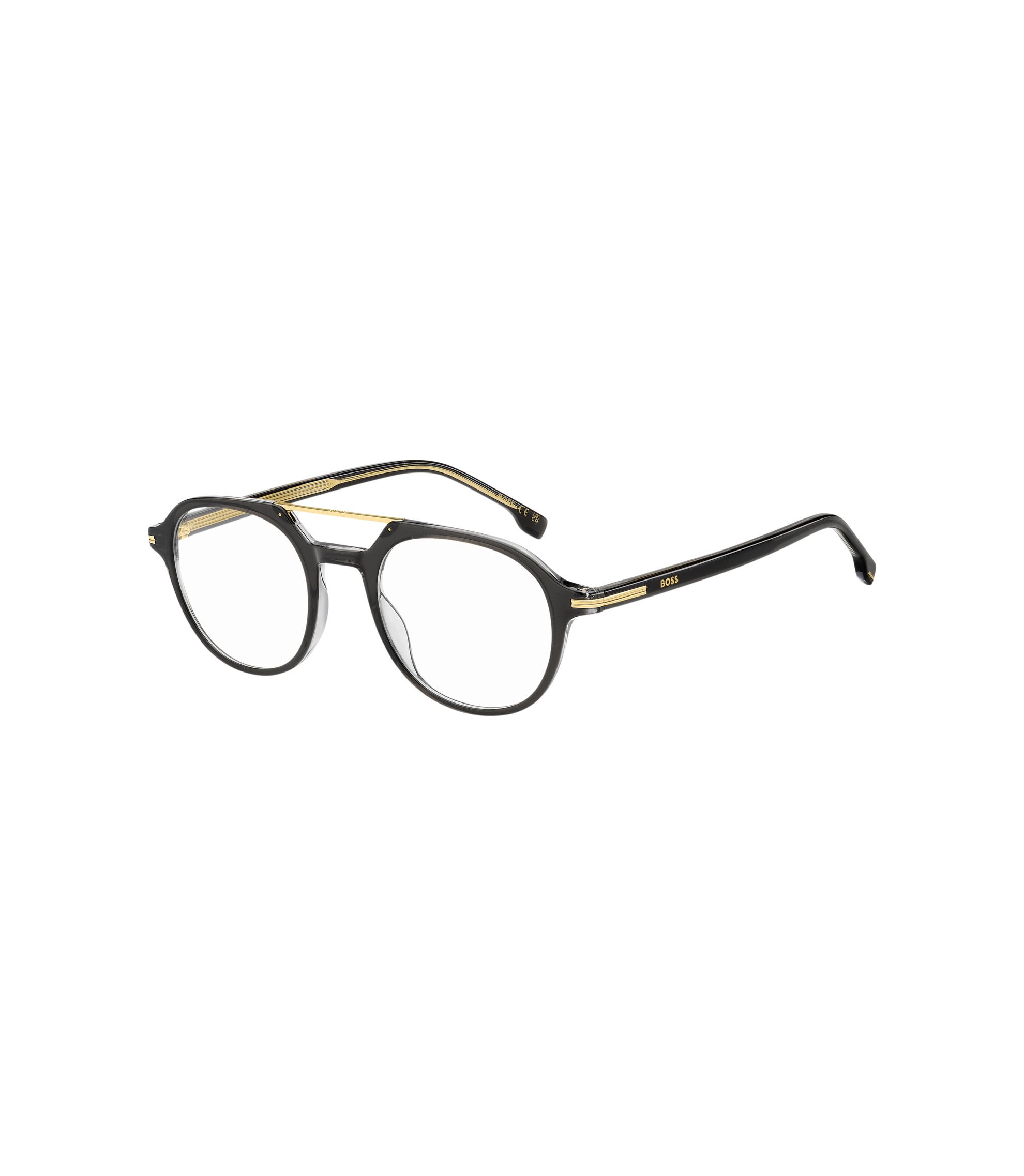 Brillenfassung aus schwarzem Acetat mit goldfarbenem Metallsteg