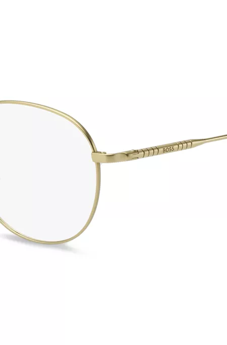 Goldfarbene Brillenfassung mit röhrenförmigen Bügeln