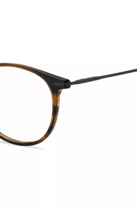 Brillenfassung aus braunem Horn mit Metallbügeln