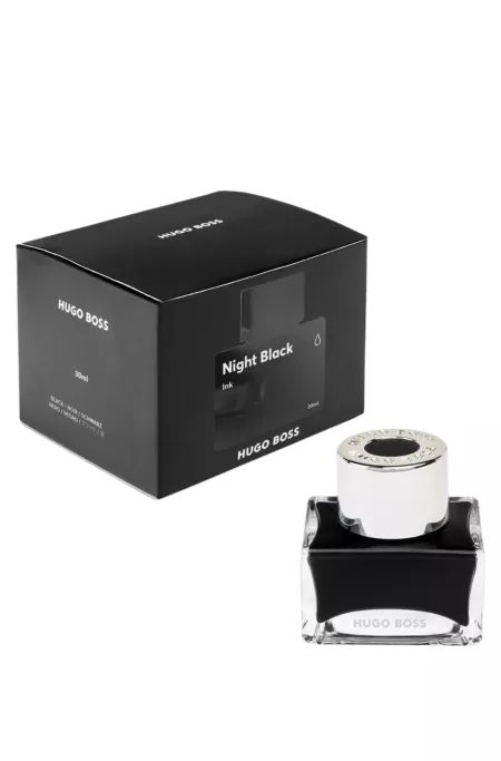Branded fountain pen ink bottle in black