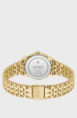 Graceful gold-tone watch with sunburst-patterned dial, Gold tone