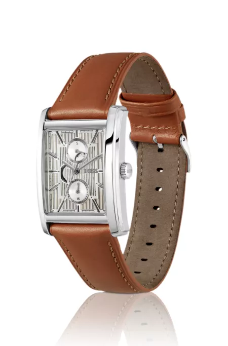 Silver-tone watch with textured skeleton dial