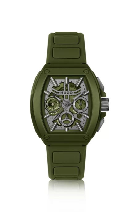 Green skeleton-dial watch with silicone strap