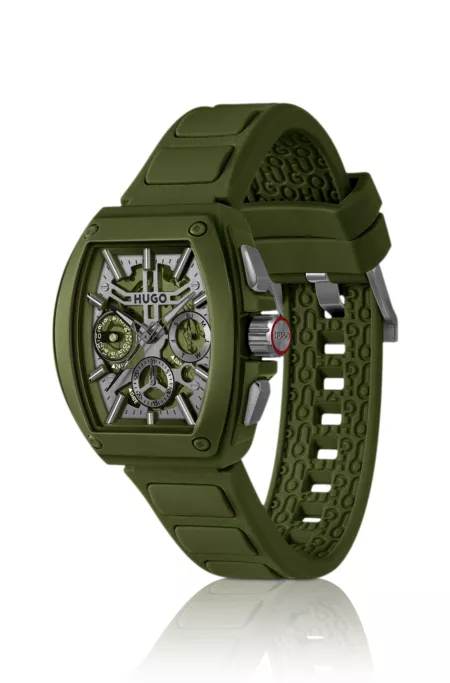 Green skeleton-dial watch with silicone strap