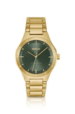 Lit gold-tone watch with green dial