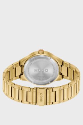 Lit gold-tone watch with green dial, Gold tone